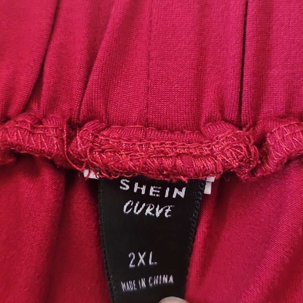 *PRICE DROP*
SHEIN Curve Red Athletic Shorts with White Trim - Picture 7 of 10